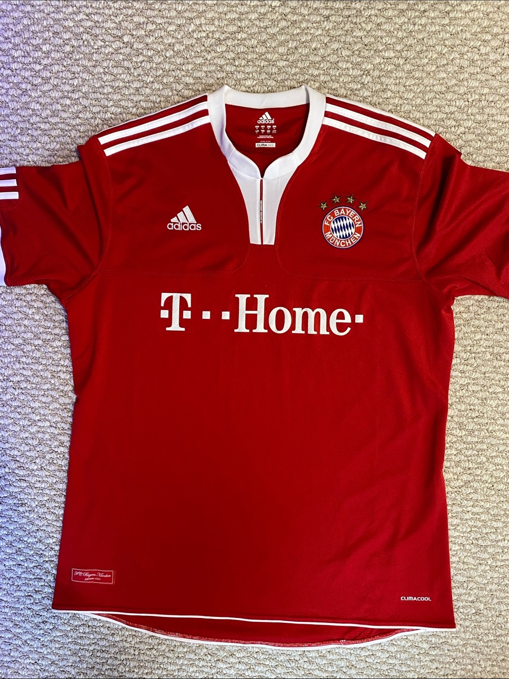 Adidas FC Bayern München Logo on Red Fabric